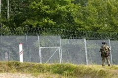 Группа вооруженных людей в масках совершила провокационное нападение на границе Латвии